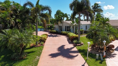 Absolutely stunning and one-of-a-kind corner lot with wraparound on Savanna Golf Club in Florida - for sale on GolfHomes.com, golf home, golf lot