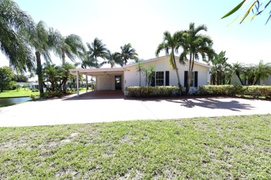 Absolutely stunning and one-of-a-kind corner lot with wraparound on Savanna Golf Club in Florida - for sale on GolfHomes.com, golf home, golf lot