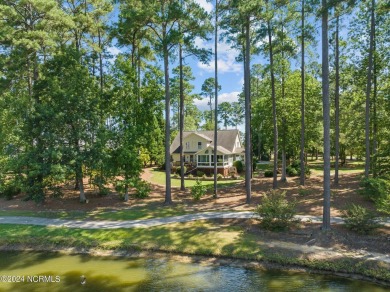 Nestled among the pines on this .76 acre lot is a beautiful on Cypress Landing Golf Club in North Carolina - for sale on GolfHomes.com, golf home, golf lot