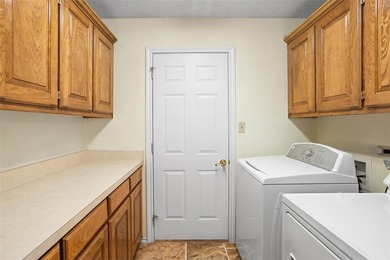 Don't miss this meticulously maintained, two-owner home in the on Pecan Plantation Country Club in Texas - for sale on GolfHomes.com, golf home, golf lot