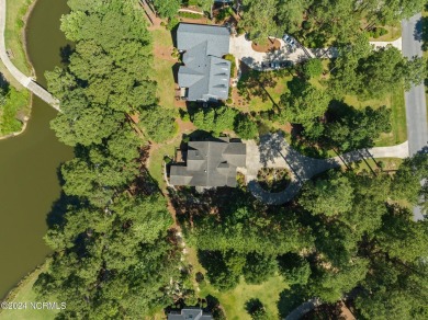 Nestled among the pines on this .76 acre lot is a beautiful on Cypress Landing Golf Club in North Carolina - for sale on GolfHomes.com, golf home, golf lot