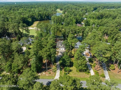 Nestled among the pines on this .76 acre lot is a beautiful on Cypress Landing Golf Club in North Carolina - for sale on GolfHomes.com, golf home, golf lot