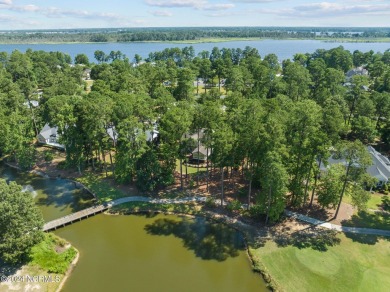 Nestled among the pines on this .76 acre lot is a beautiful on Cypress Landing Golf Club in North Carolina - for sale on GolfHomes.com, golf home, golf lot