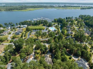 Nestled among the pines on this .76 acre lot is a beautiful on Cypress Landing Golf Club in North Carolina - for sale on GolfHomes.com, golf home, golf lot