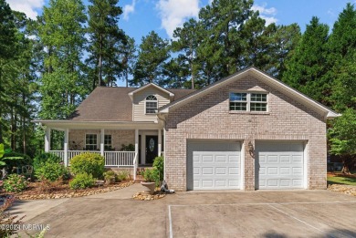 Nestled among the pines on this .76 acre lot is a beautiful on Cypress Landing Golf Club in North Carolina - for sale on GolfHomes.com, golf home, golf lot