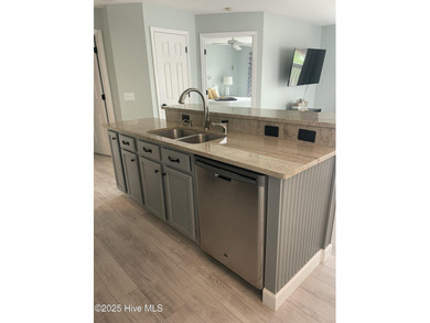 Bright & Fresh Condo with Golf & Pond Views | 2 BR, 2 BA Welcome on Members Club At St. James Plantation in North Carolina - for sale on GolfHomes.com, golf home, golf lot