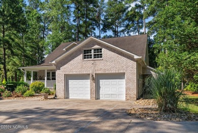 Nestled among the pines on this .76 acre lot is a beautiful on Cypress Landing Golf Club in North Carolina - for sale on GolfHomes.com, golf home, golf lot