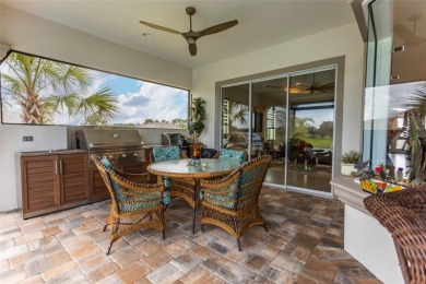 THIS IS IT, YOUR PERFECT FOREVER POOL HOME WITH SUMMER KITCHEN on Conservatory Course At Hammock Beach Resort in Florida - for sale on GolfHomes.com, golf home, golf lot