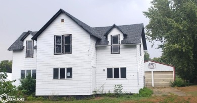 This property is an excellent investment opportunity for fix and on Aurelia Golf Club in Iowa - for sale on GolfHomes.com, golf home, golf lot