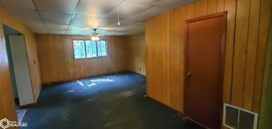 This property is an excellent investment opportunity for fix and on Aurelia Golf Club in Iowa - for sale on GolfHomes.com, golf home, golf lot