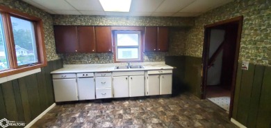 This property is an excellent investment opportunity for fix and on Aurelia Golf Club in Iowa - for sale on GolfHomes.com, golf home, golf lot