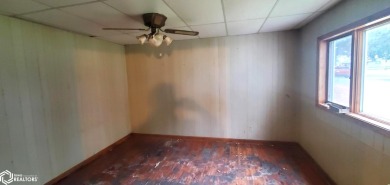 This property is an excellent investment opportunity for fix and on Aurelia Golf Club in Iowa - for sale on GolfHomes.com, golf home, golf lot