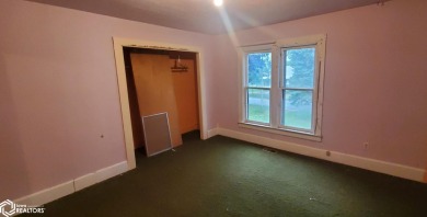 This property is an excellent investment opportunity for fix and on Aurelia Golf Club in Iowa - for sale on GolfHomes.com, golf home, golf lot