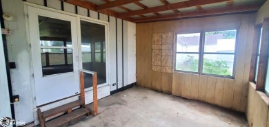 This property is an excellent investment opportunity for fix and on Aurelia Golf Club in Iowa - for sale on GolfHomes.com, golf home, golf lot