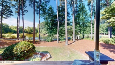 Nestled among the pines on this .76 acre lot is a beautiful on Cypress Landing Golf Club in North Carolina - for sale on GolfHomes.com, golf home, golf lot