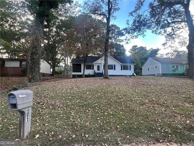 Amazing investment opportunity in East Lake! This property is on East Lake Golf Club in Georgia - for sale on GolfHomes.com, golf home, golf lot