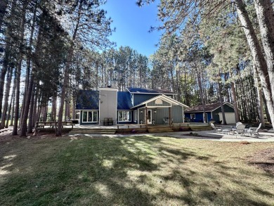 Spacious executive home on the beautiful Pines Golf Course in on Michaywe Pines Course in Michigan - for sale on GolfHomes.com, golf home, golf lot