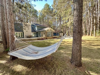 Spacious executive home on the beautiful Pines Golf Course in on Michaywe Pines Course in Michigan - for sale on GolfHomes.com, golf home, golf lot