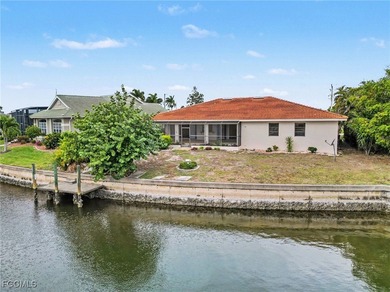 PRIME WATERFRONT LOCATION IN PUNTA GORDA ISLES! An AMAZING PRICE on Saint Andrews South Golf Club in Florida - for sale on GolfHomes.com, golf home, golf lot