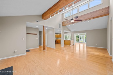 Enjoy spectacular sunsets from nearly every room in this on Harbour Point Golf Club in North Carolina - for sale on GolfHomes.com, golf home, golf lot