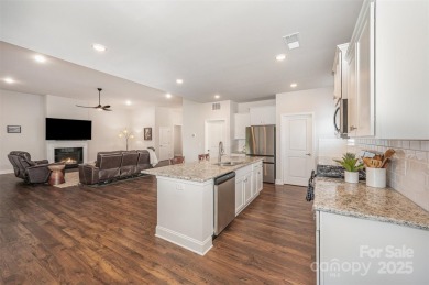 Move-in ready ranch in The Villages at Redbridge with views of on Red Bridge Golf and Country Club in North Carolina - for sale on GolfHomes.com, golf home, golf lot