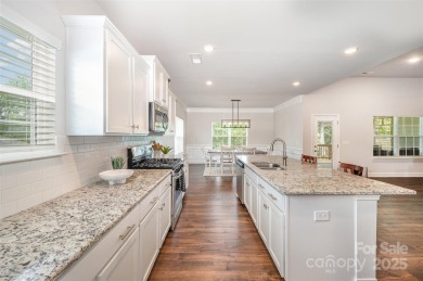 Move-in ready ranch in The Villages at Redbridge with views of on Red Bridge Golf and Country Club in North Carolina - for sale on GolfHomes.com, golf home, golf lot