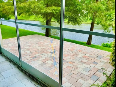 This beautiful, light-filled corner townhome feels special from on Innisbrook Resort and Golf Club in Florida - for sale on GolfHomes.com, golf home, golf lot