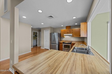 Enjoy spectacular sunsets from nearly every room in this on Harbour Point Golf Club in North Carolina - for sale on GolfHomes.com, golf home, golf lot