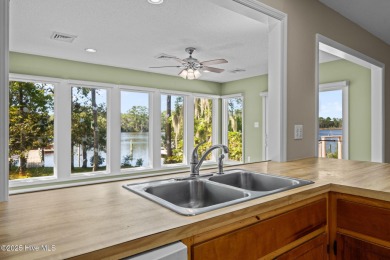 Enjoy spectacular sunsets from nearly every room in this on Harbour Point Golf Club in North Carolina - for sale on GolfHomes.com, golf home, golf lot