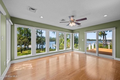 Enjoy spectacular sunsets from nearly every room in this on Harbour Point Golf Club in North Carolina - for sale on GolfHomes.com, golf home, golf lot
