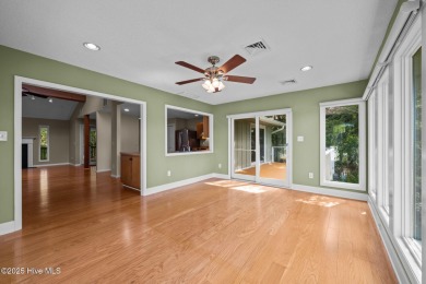 Enjoy spectacular sunsets from nearly every room in this on Harbour Point Golf Club in North Carolina - for sale on GolfHomes.com, golf home, golf lot