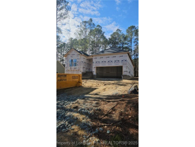 This stunning, brand-new home is nestled in the highly on Carolina Trace Country Club in North Carolina - for sale on GolfHomes.com, golf home, golf lot