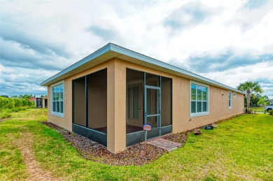 Charming 2 bedroom, 2 bath home with a study is nestled in the on Stonegate Golf Club in Florida - for sale on GolfHomes.com, golf home, golf lot