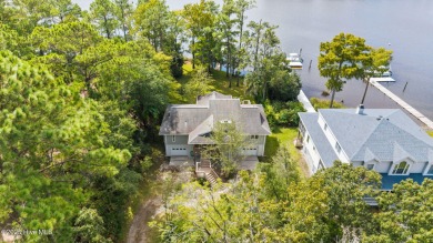 Enjoy spectacular sunsets from nearly every room in this on Harbour Point Golf Club in North Carolina - for sale on GolfHomes.com, golf home, golf lot