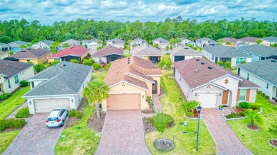 Charming 2 bedroom, 2 bath home with a study is nestled in the on Stonegate Golf Club in Florida - for sale on GolfHomes.com, golf home, golf lot