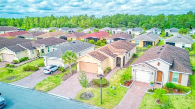 Charming 2 bedroom, 2 bath home with a study is nestled in the on Stonegate Golf Club in Florida - for sale on GolfHomes.com, golf home, golf lot