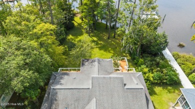 Enjoy spectacular sunsets from nearly every room in this on Harbour Point Golf Club in North Carolina - for sale on GolfHomes.com, golf home, golf lot
