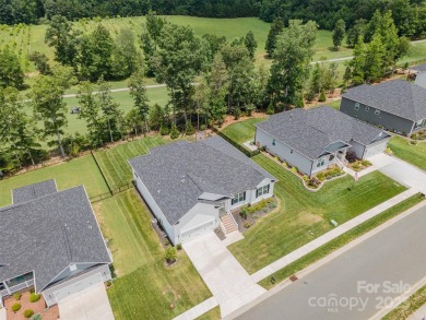 Move-in ready ranch in The Villages at Redbridge with views of on Red Bridge Golf and Country Club in North Carolina - for sale on GolfHomes.com, golf home, golf lot
