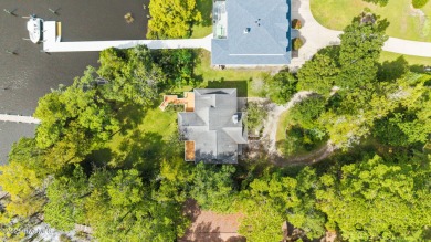 Enjoy spectacular sunsets from nearly every room in this on Harbour Point Golf Club in North Carolina - for sale on GolfHomes.com, golf home, golf lot