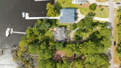Enjoy spectacular sunsets from nearly every room in this on Harbour Point Golf Club in North Carolina - for sale on GolfHomes.com, golf home, golf lot