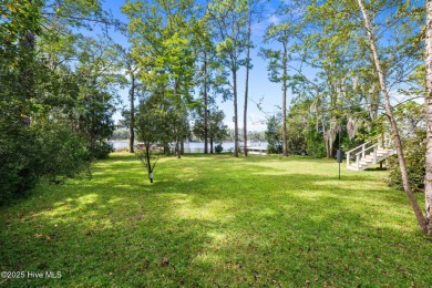 Enjoy spectacular sunsets from nearly every room in this on Harbour Point Golf Club in North Carolina - for sale on GolfHomes.com, golf home, golf lot