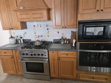 PRIVACY In Town.  Golfers can walk to #1 Tee and walk back home on Olive Glenn Golf and Country Club in Wyoming - for sale on GolfHomes.com, golf home, golf lot