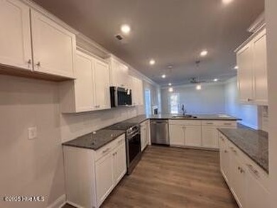 Home is complete. The 1727 floor plan by Adams Homes is a on River Landing Golf Course in North Carolina - for sale on GolfHomes.com, golf home, golf lot