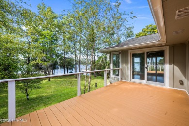Enjoy spectacular sunsets from nearly every room in this on Harbour Point Golf Club in North Carolina - for sale on GolfHomes.com, golf home, golf lot