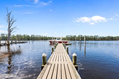 Enjoy spectacular sunsets from nearly every room in this on Harbour Point Golf Club in North Carolina - for sale on GolfHomes.com, golf home, golf lot