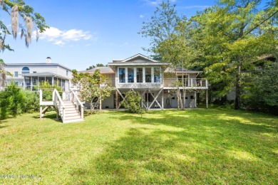 Enjoy spectacular sunsets from nearly every room in this on Harbour Point Golf Club in North Carolina - for sale on GolfHomes.com, golf home, golf lot