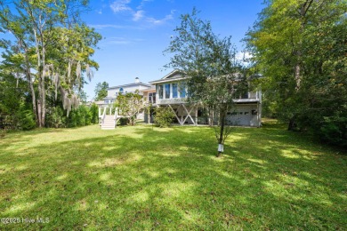 Enjoy spectacular sunsets from nearly every room in this on Harbour Point Golf Club in North Carolina - for sale on GolfHomes.com, golf home, golf lot