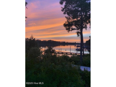 Enjoy spectacular sunsets from nearly every room in this on Harbour Point Golf Club in North Carolina - for sale on GolfHomes.com, golf home, golf lot
