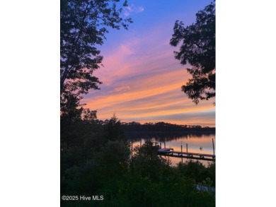 Enjoy spectacular sunsets from nearly every room in this on Harbour Point Golf Club in North Carolina - for sale on GolfHomes.com, golf home, golf lot