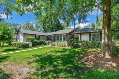 Welcome to this spacious 4-bedroom, 2-bath home located in the on Gainesville Golf and Country Club in Florida - for sale on GolfHomes.com, golf home, golf lot